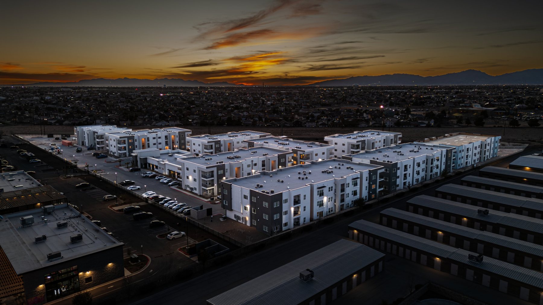 Greyfield multifamily development at dusk